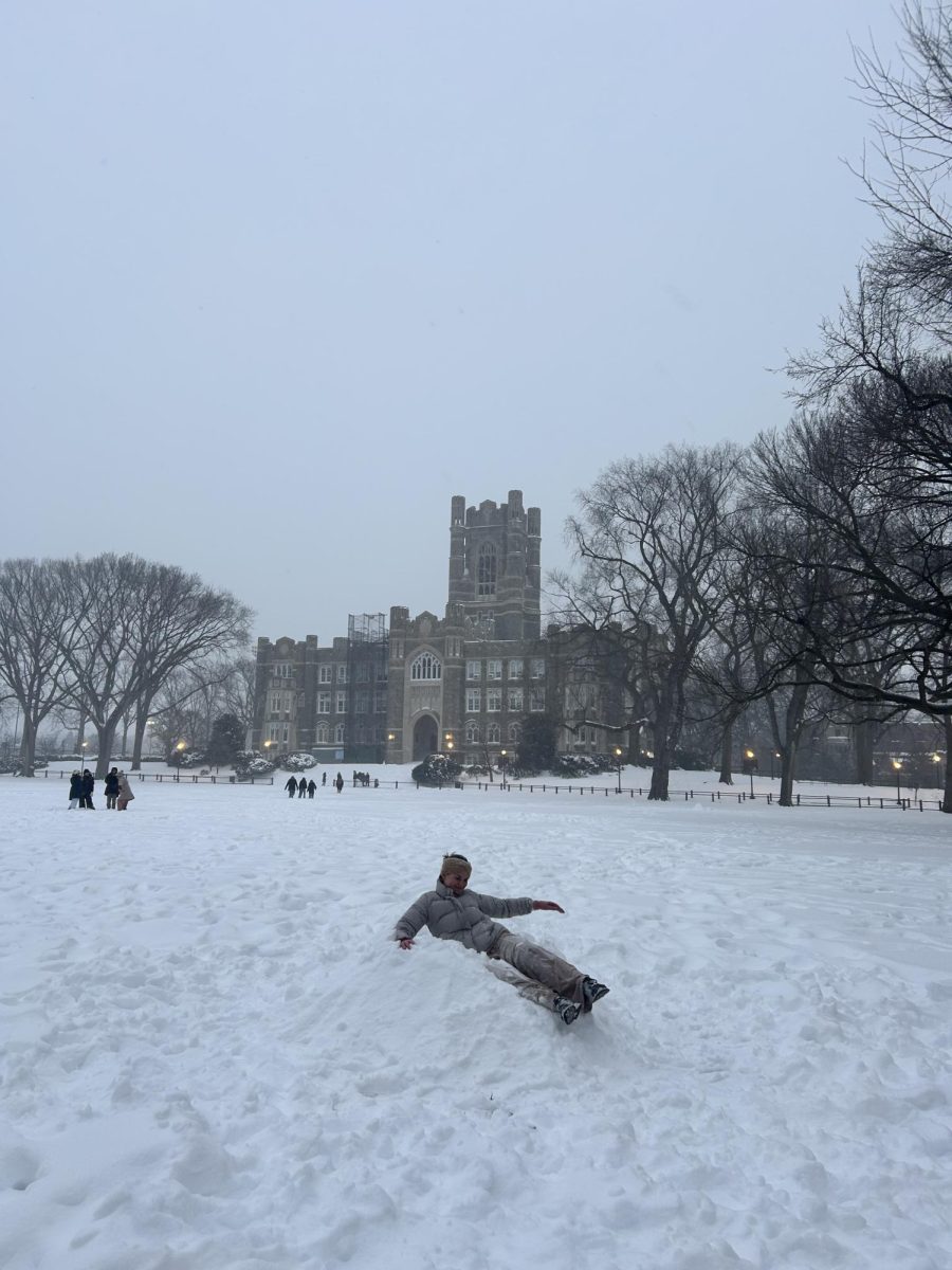 DeRosa's friend playing in the snow on Eddie's Parade.