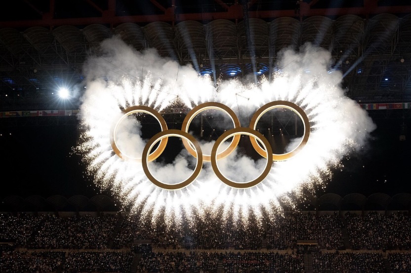 The Olympic rings hanging above the stage during the opening ceremony in Italy.