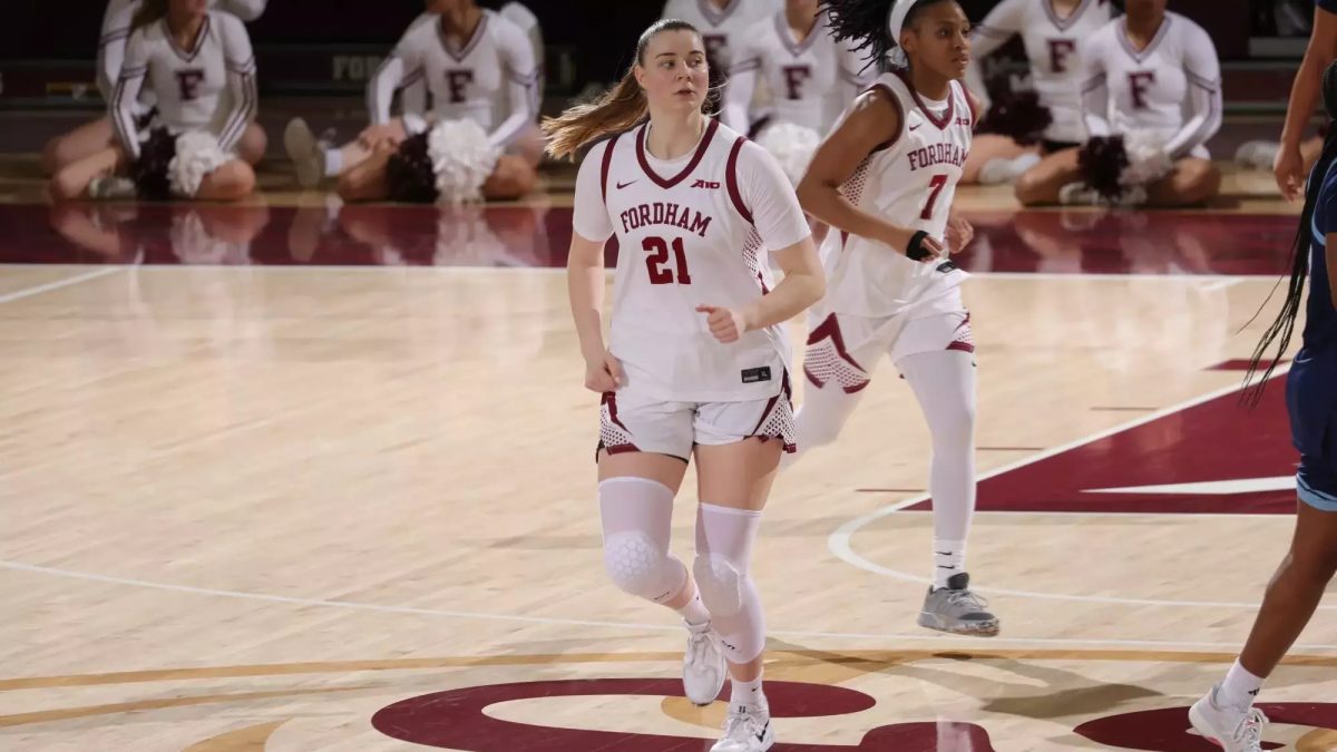 Fordham Women’s Basketball displaying aggression and skill on the court.