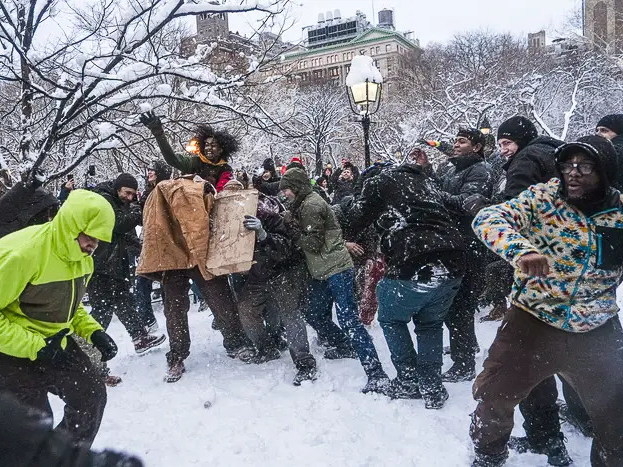 New Yorkers had a snowball fight in Washington Square Park.