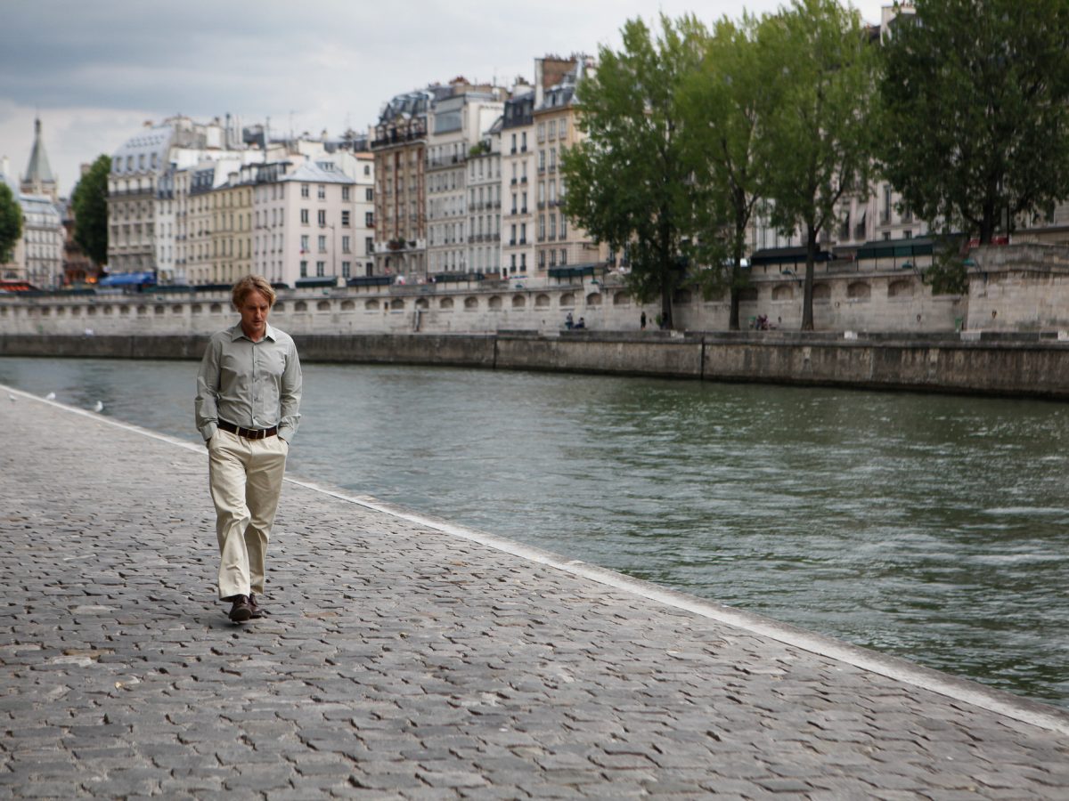 Owen Wilson as Gil walking along the Seine in "Midnight in Paris."