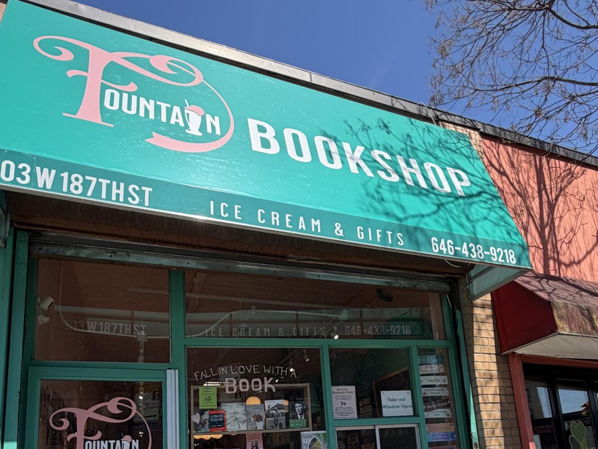 The entrance of Fountain Bookshop invites readers in with promises of good books and ice cream.