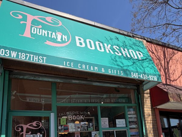 The entrance of Fountain Bookshop invites readers in with promises of good books and ice cream.