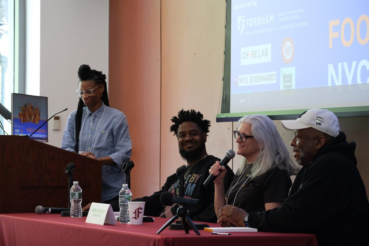 Shellae Versey, Ph.D. speaks during the event about food insecurity.