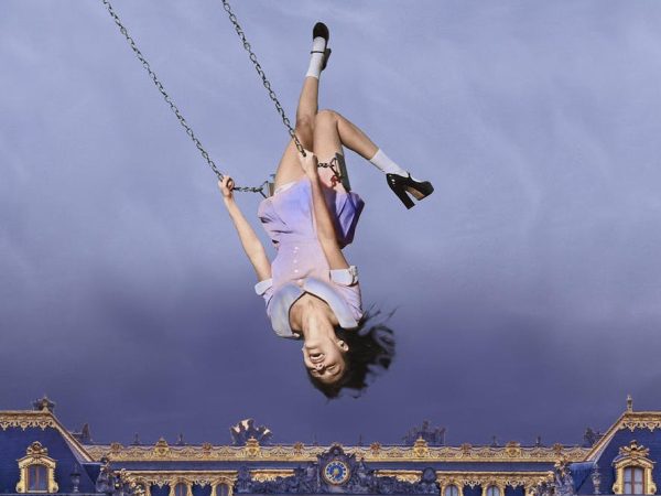 Olivia Rodrigo swings above Versailles as she sings her heart out.